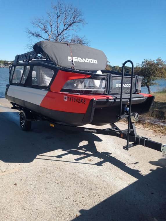 Sea-Doo Switch pontoon on a trailer near the lake